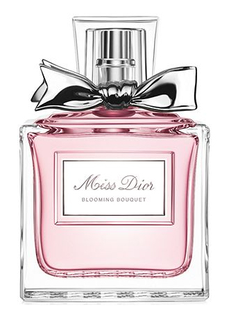 A square glass bottle of Miss Dior Blooming Bouquet with its signature silver "couture" bow and pink liquid, surrounded by soft pink peonies and roses.