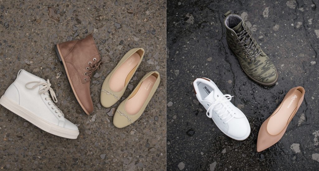Assortment of spring footwear including white sneakers, tan ankle boots, and neutral ballet flats on a wet pavement